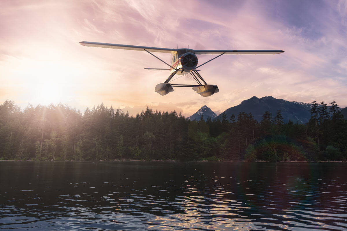Airplane with floats to land on water representing Vancouver Seaplanes.