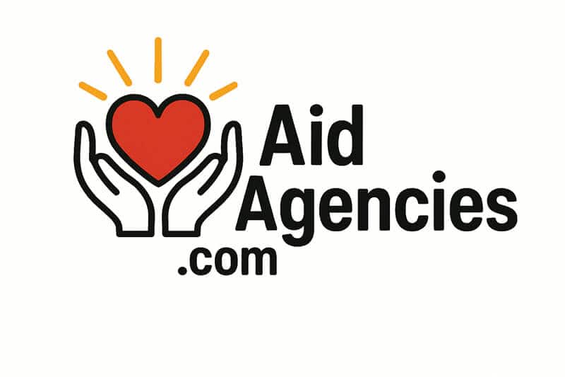 AidAgencies logo featuring a red heart held by two hands with radiant lines.